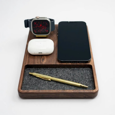 walnut wooden MagSafe charging station for Apple devices

3-in-1 wireless iPhone Apple Watch AirPods dock

wooden charging dock with felt-lined tray

Catura Deluxe charging station with accessory tray

handcrafted walnut Apple device organizer

