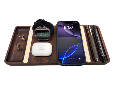 Walnut wooden MagSafe charging station with iPhone, Apple Watch, AirPods, LED night light, and accessory storage